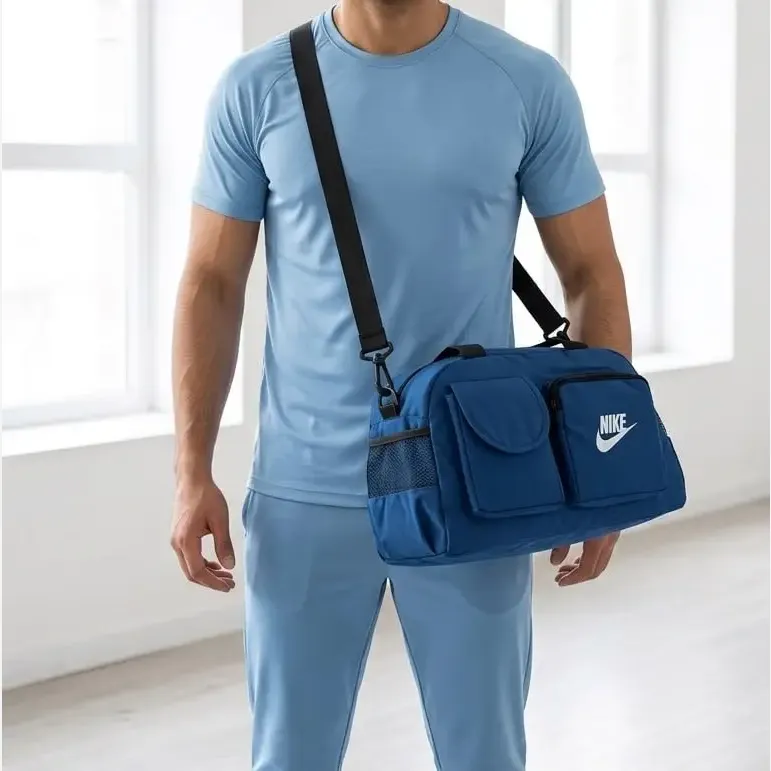 ساک ورزشی اسپرت پارچهای با بند بلند و 5 جیب بیرونی ابعاد 45 در 25 در 20 سانتیمتر